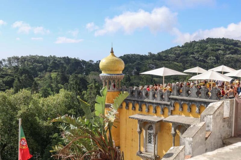 From Lisbon: Small Group to Pena Palace, Nazaré & Fátima - The Guide: Knowledge, Stories, and Flexibility