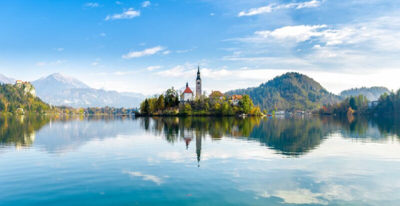 From Ljubljana: Lake Bled & Postojna Cave with Entry Tickets - Discovering Lake Bled’s Iconic Beauty and Activities