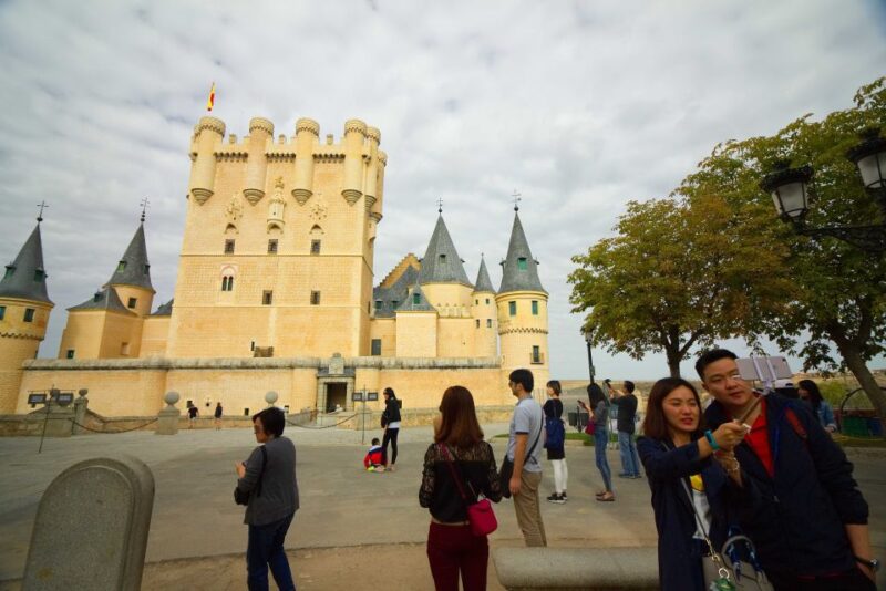From Madrid: Segovia & Avila Day Trip with Optional Tickets - Walking Through the Canonjías Neighborhood and Old Town