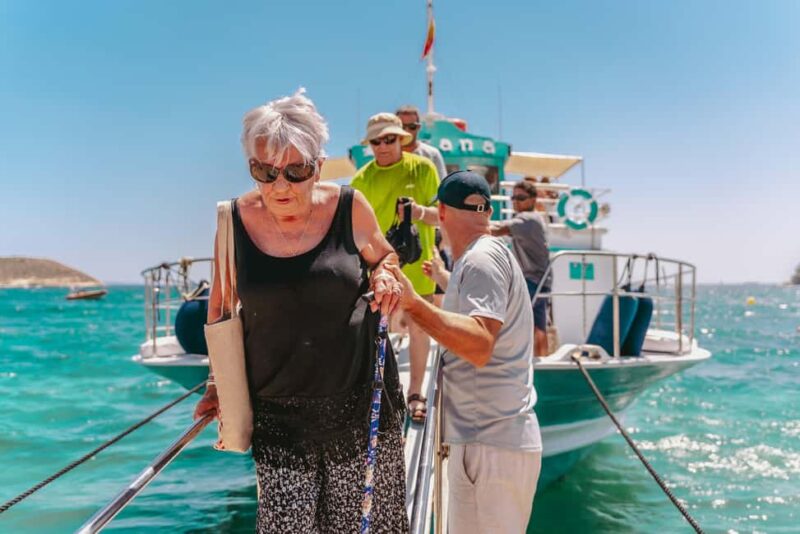 From Magaluf: Palma Bay Sightseeing Cruise with Live Music - The Atmosphere and Crowd Level