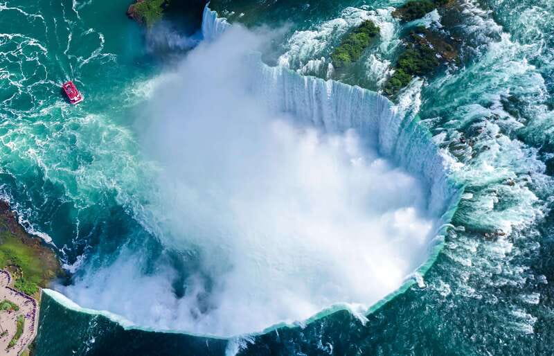 From Montreal: Toronto, Niagara Falls & 1000 Islands Tour - Up-close views of Niagara Falls: Hornblower Cruise or Journey Behind the Falls