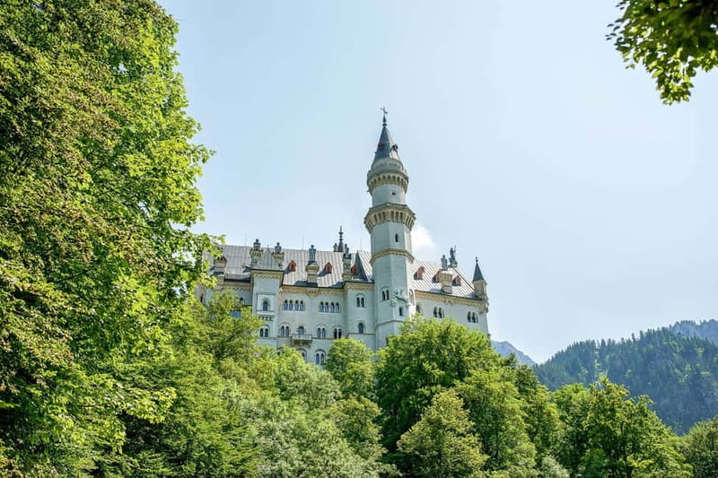 From Munich: Neuschwanstein & Linderhof Castle Full-Day Trip - Walking Across Marienbrücke for Iconic Views