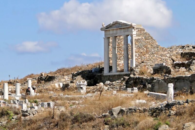 From Mykonos: Delos Archaeological Site Guided Evening Tour - Free Time for Personal Exploration and Museum Visits