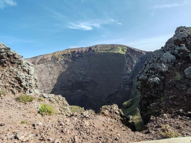 From Naples: Explore Pompeii and Vesuvius by bus - Climbing Mount Vesuvius: panoramic views and volcanic terrain