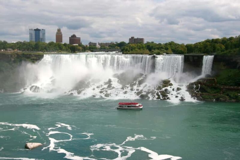 From Niagara Falls, USA: Canadian Side Tour w/ Boat Ride - Journey Behind the Falls: Exploring Cave-Like Tunnels