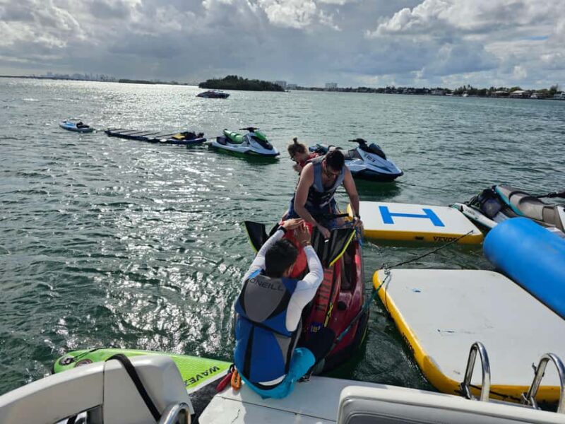 From North Bay Village: Private Boat Party with Champagne - Visiting Haulover Sandbar – A Local Favorite for Water Fun