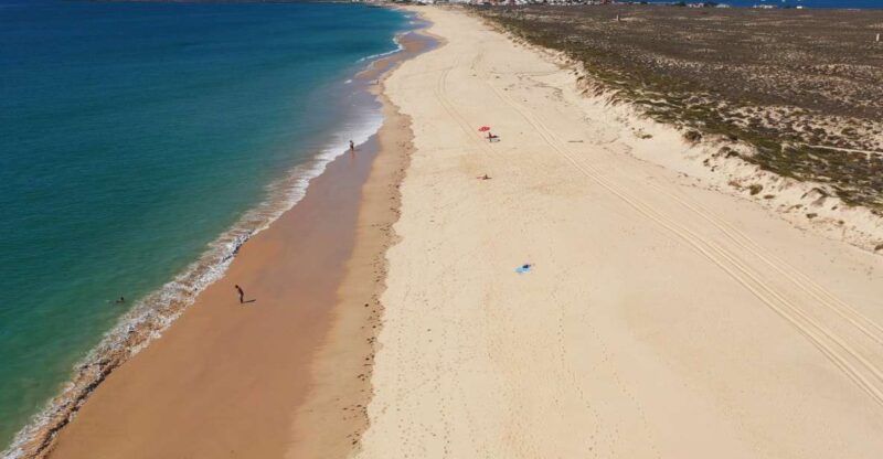 From Olhão: Ria Formosa 3-Island Full-Day Tour with Sunset - Visiting Lighthouse Island: A Tranquil Village and Lighthouse