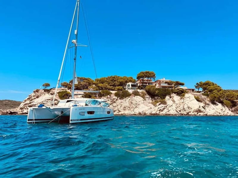 From Palma: Luxury Catamaran Group Tour with Tapas & Drinks - The Starting Point at La Lonja Marina in Palma