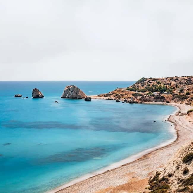 From Paphos: Sunset Drink at Aphrodite's Rock & Folk Dinner - Lively Folk Music and Dancing on the Outdoor Terrace