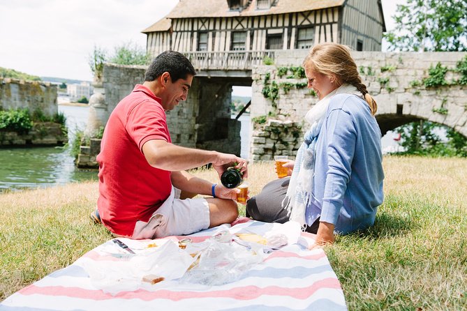 From Paris: Monet Gardens & Giverny Bike Tour with Picnic Stop - Giverny’s Historic Cemetery and Hotel Baudy