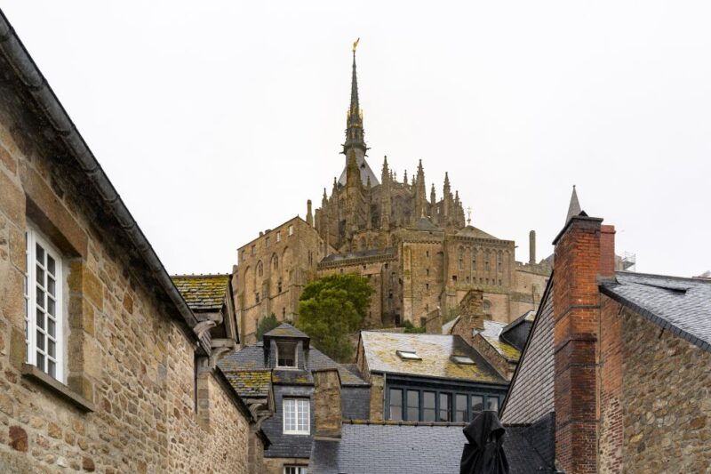 From Paris: Mont Saint Michel Day Trip with a Guide - Exploring Mont Saint Michels Hilltop Abbey