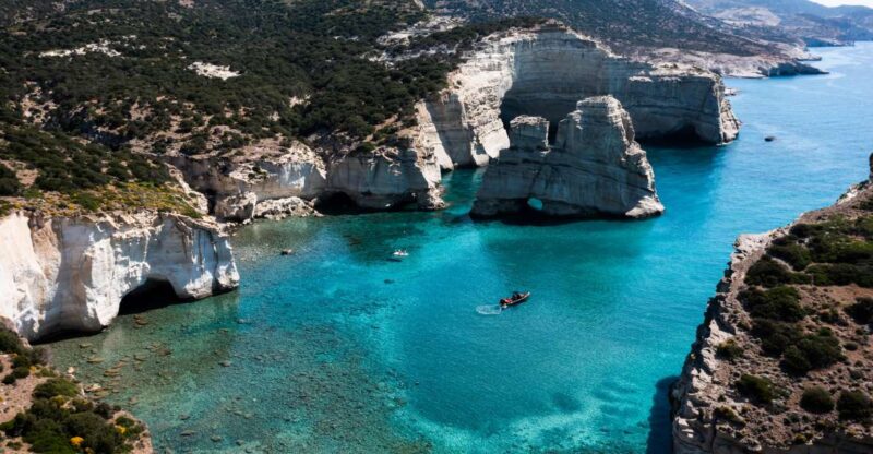 From Pollonia: Private Boat Tour to Kleftiko and Sykia Cave - Tsigrado Beach and Its Dramatic Coastal Landscape