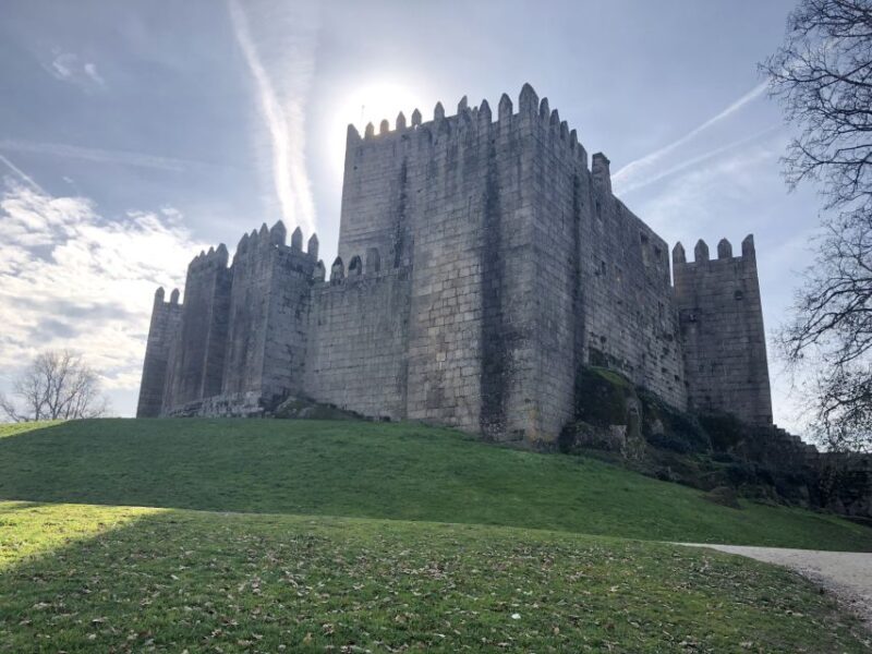 From Porto: Braga and Guimarães Full Day Tour with Lunch - Walking Through Medieval Guimarães and Visiting the Castle