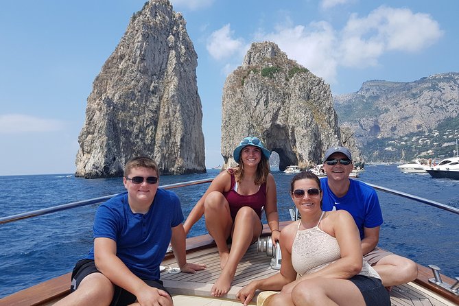From Positano: Small Group Boat Tour to Capri Island - Handling the Blue Grotto and Weather Considerations
