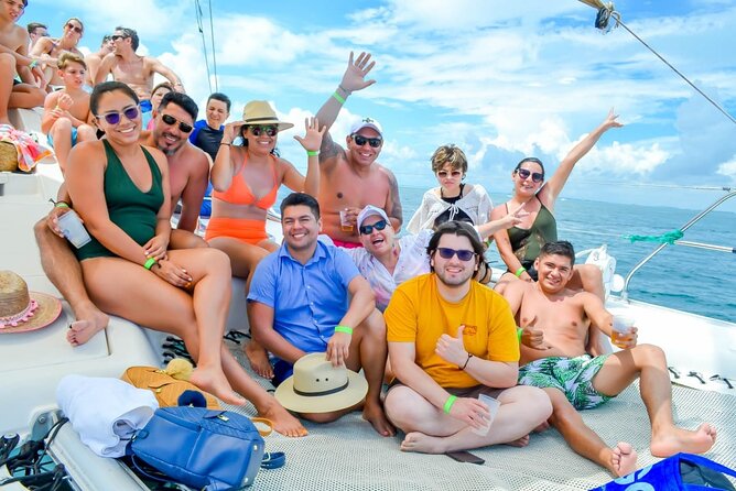 From Puerto Morelos: Luxury Catamaran Excursion to Isla Mujeres - Sunset Sail and Final Fiesta