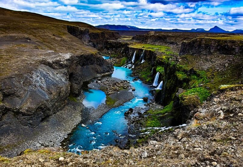 From Reykjavik: Day Tour to Landmannalaugar in a 4X4 - Hnausapollur Crater Lake and Hjálparfoss Waterfalls