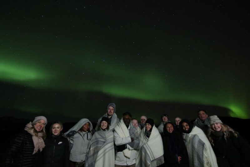 From Reykjavik: Northern Lights Tour with Hot Cocoa & Photos - Practicalities: What to Bring and Expect