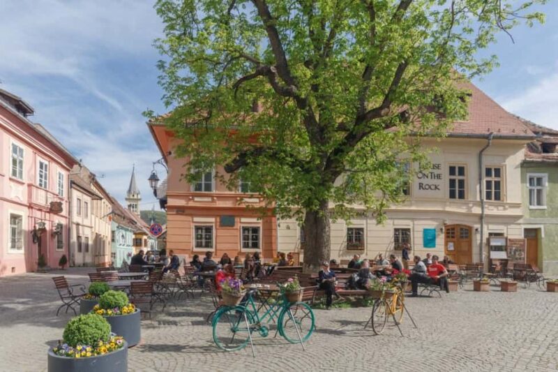 From Sibiu: Blue Line & City Tour Sighisoara - UNESCO - Exploring the Heart of Sighisoara: The Market Square