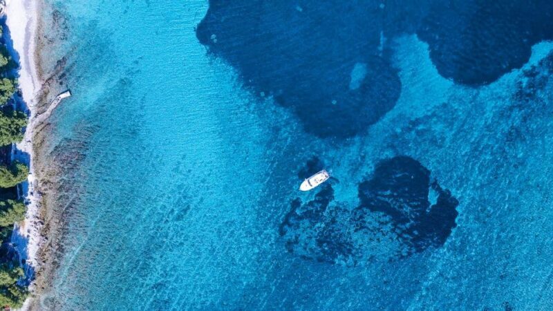 From Split: Blue Lagoon and Trogir Half-Day Speedboat Tour - The Skipper and Guide Experience