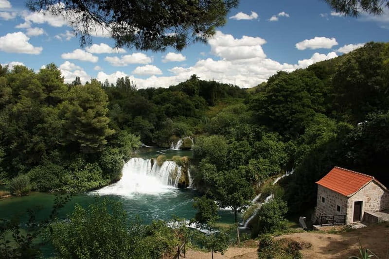 From Split: Krka Waterfalls with Riverboat Ride & swimm stop - Key Points