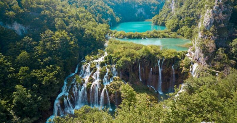 From Split or Trogir: Plitvice Lakes Guided Tour - Unique Activities: Boat Ride on Kozjak Lake and Electric Train Journey