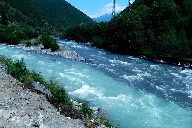 From Tbilisi Daytrip Kazbegi Gudauri & Zhinvali Guided Group Tour - Pasanauri: River Confluence and Local Flavors