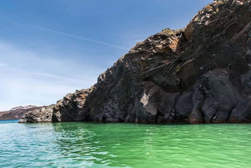 From Thera: Thirasia Cruise w/ Volcano Hike and Hot Springs - Visiting the Active Volcano at Nea Kameni