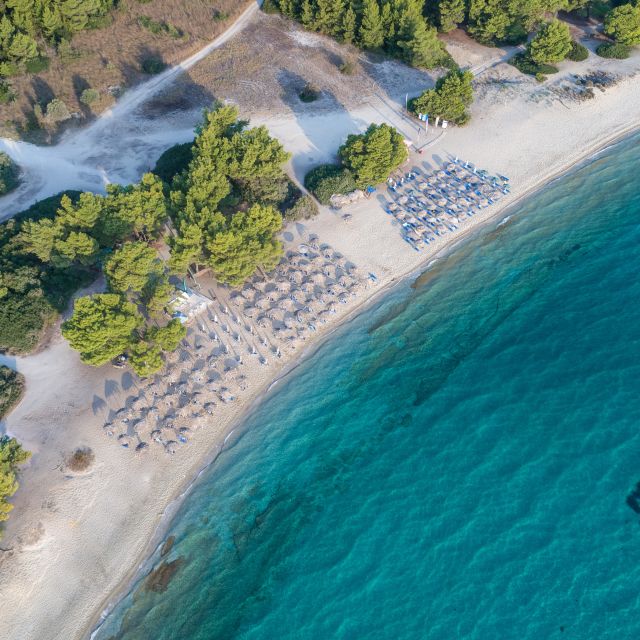 From Thessaloniki: Private Day Trip to Kassandra Chalkidiki - Relaxing at Hanioti Beach: Swimming and Water Sports
