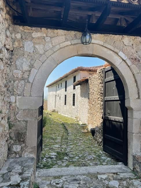 From Tirana: Durres & Kruja History and Local Food Day Trip - Walking through Durres’s Historic Sites