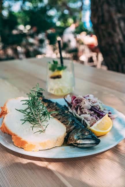 From Trogir: Blue Lagoon & olta Cruise with Lunch & Drinks - Visiting Maslinica: A Picturesque Fishing Village