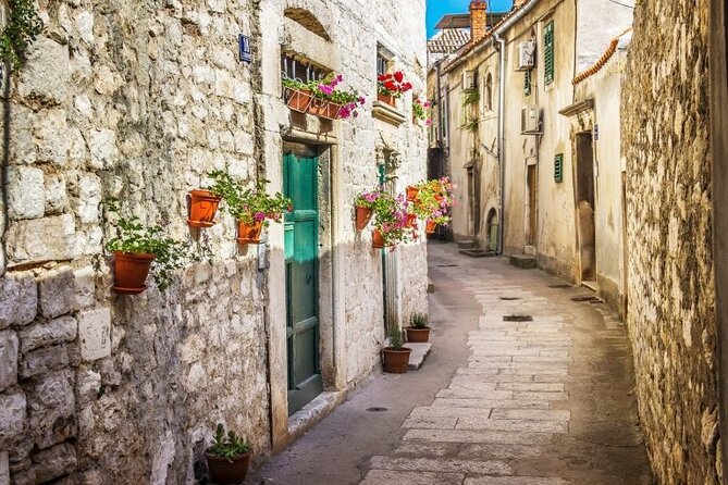 From Trogir, Seget, Okrug: Krka Waterfalls & ibenik Culture Tour - Scenic Boat Ride from Krka National Park to Skradin