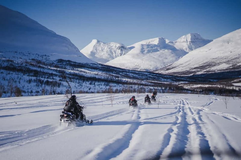 From Tromsø: Snowmobiling at Camp Tamok & Snow Park Visit - Snowmobiling through Arctic Landscapes