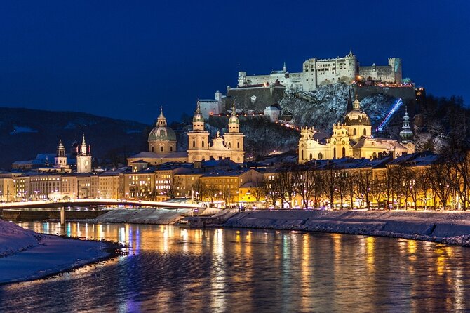 From Vienna: Day Tour to Hallstatt and Salzburg with Boat Ride - Key Points