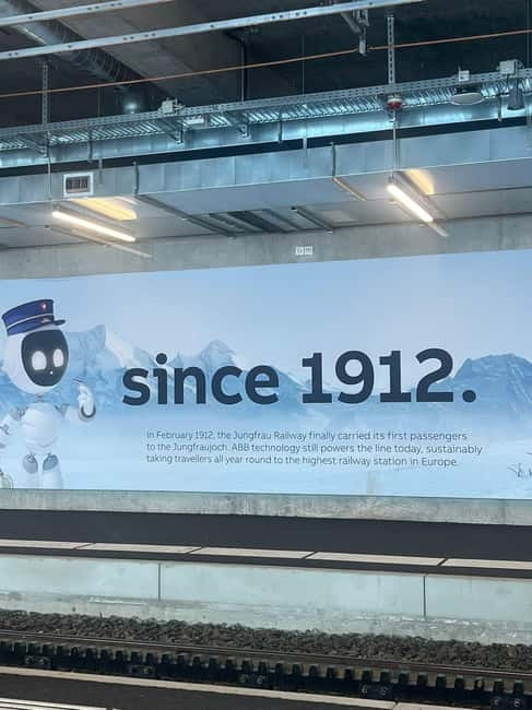 From Zurich: Jungfraujoch Day Trip with Cable Car and Train - Exploring Jungfraujoch: Glacier Cave, Shops, and Views