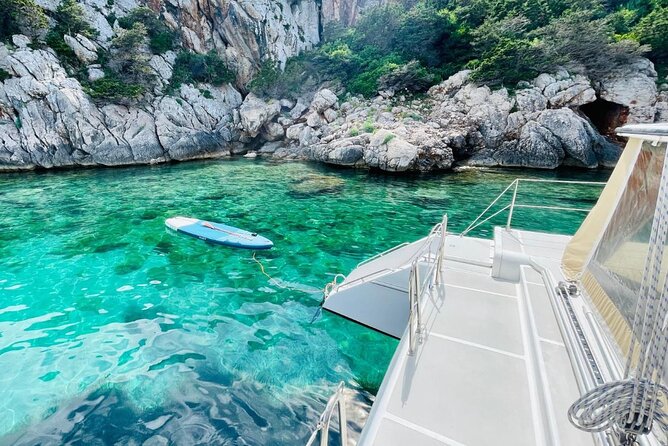 Full day Catamaran cruise in Porto Conte Natural Park - The Onboard Seafood Lunch Experience