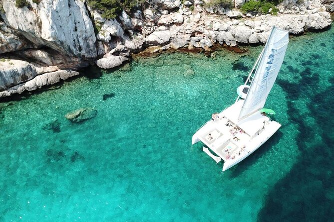 Full day Catamaran cruise in Porto Conte Natural Park - The Skipper and Crew: Personalized Service