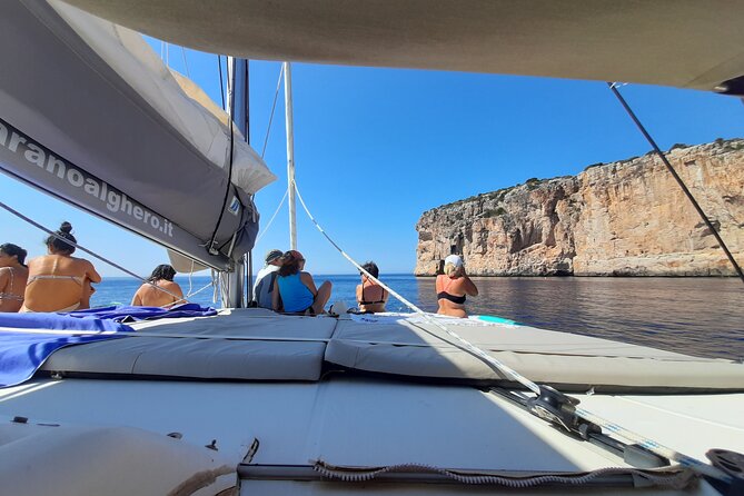 Full day catamaran tour in Alghero - Key Points