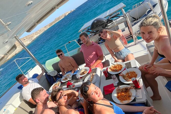 Full Day Discovering Mykonos Delos Renia Tour by Boat - Greek Lunch and Unlimited Drinks on Board
