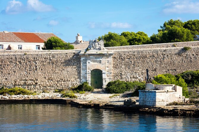 Full Day Mahon Harbour, Binibeca and Xoroi Cave Tour in Minorca - Practical Details: Transport, Guides, and Accessibility