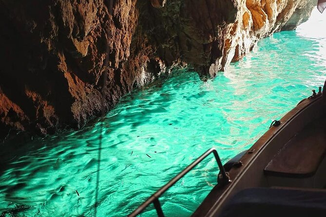 Full day on a private boat to discover Capri - Viewing the Natural Arch from the Water