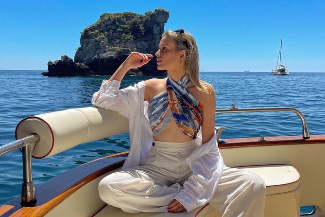 Full day Private Capri boat tour from Positano - Visiting the Green Grotto and Rugged Coastline