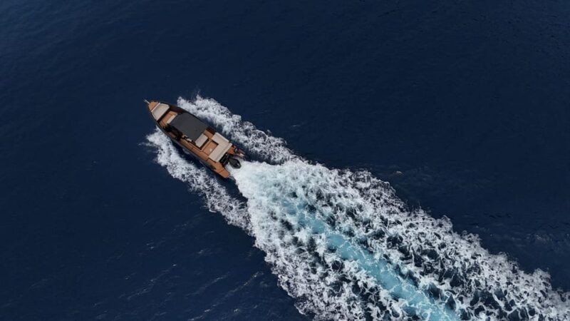 Full Day Private Captain Cruise - Scenic Views of Oia and Ammoudi Bay from the Sea