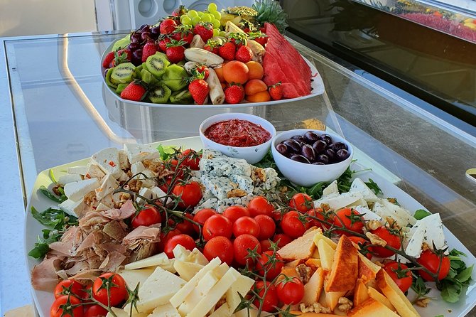 Full Day Private Yacht Cruise in Mykonos on a Ferretti Altura 52s - Onboard Amenities and Included Treats