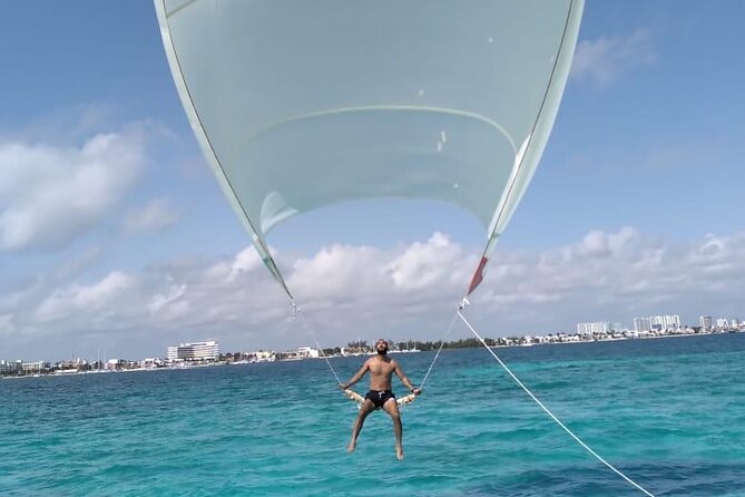 Full-Day Sailing Adventure to Isla Mujeres - Arriving at Isla Mujeres: Private Beach Club and Leisure Time