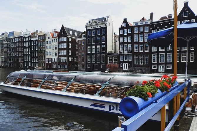 Full-Day Trip From Amsterdam to Keukenhof, Zaanse Schans + Cruise - Traditional Dutch Cheese Farm Experience