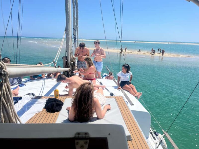 Fuzeta: Ria Formosa Blue Lagoon Sailing Tour with Snorkeling - Snorkeling at the Sunken Ship and Marine Life Exploration