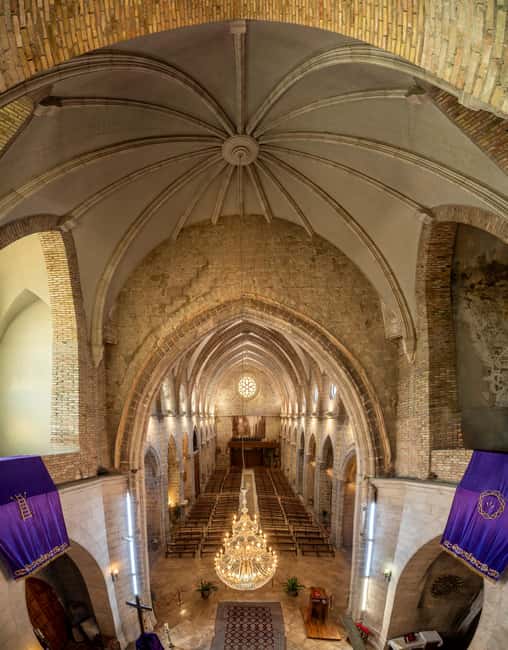 Gandía: Entrance to the Insigne Collegiate Church of Gandía - The Guided Audio Narration by María Enríquez