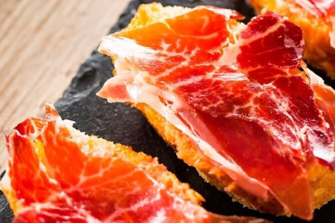 Gastronomic Tour: Discover the best Wines and Tapas of Madrid - Discover Iberian Products at Mercado Jamón Ibérico