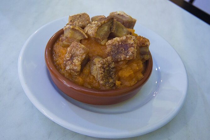 Gastronomic Tour: Discover the best Wines and Tapas of Madrid - La Latina’s Torrezno Ibérico and Historic Tapas