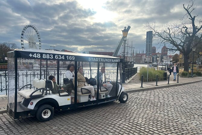 Gdansk: 2H City Sightseeing Tour LIVE GUIDED by Buggy/Golf cart - Meeting at Neptunes Fountain in the Heart of Gdansk
